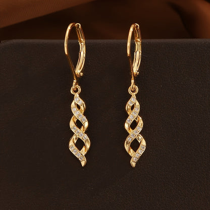 Ava ピアス シマー ツイスト | ゴールド